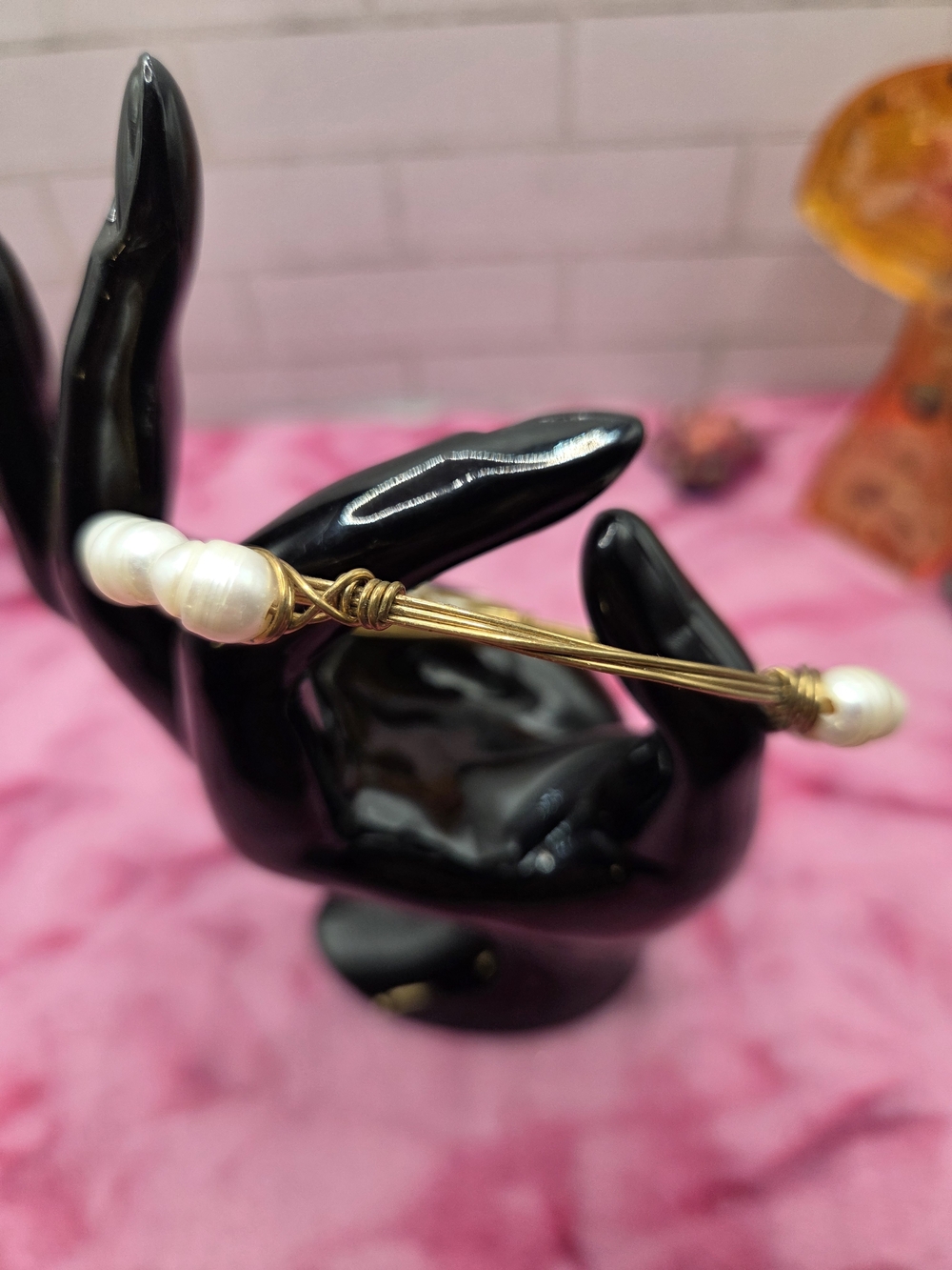 1050. Bourbon and Bowties Goldtone Wire Pearl Bracelet